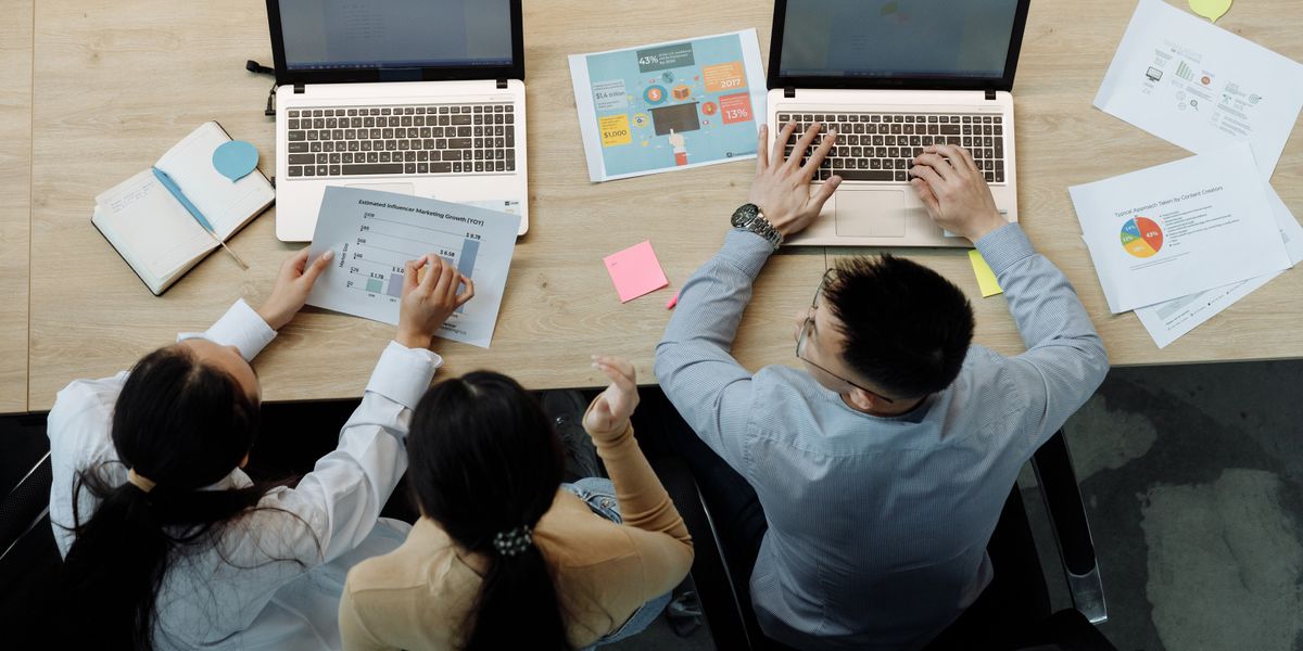 Team reviewing reports together in an office